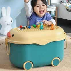 The Decor Haven Babyspielzeug-Bewegliche Aufbewahrungsbox im Cartoon-Stil für Kinder – lustiger Spielzeug-Organizer