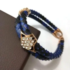 Herren Decor Herrenschuhe-Luxuriöses Pythonlederarmband - Modeschmuck mit Goldakzent